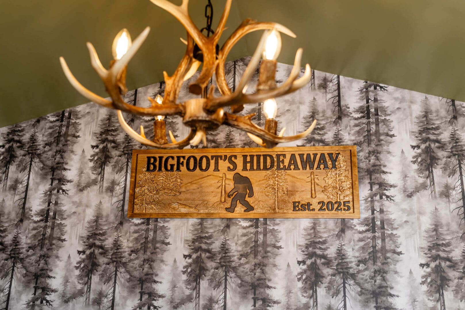 Antler chandelier above Bigfoot's Hideaway sign
